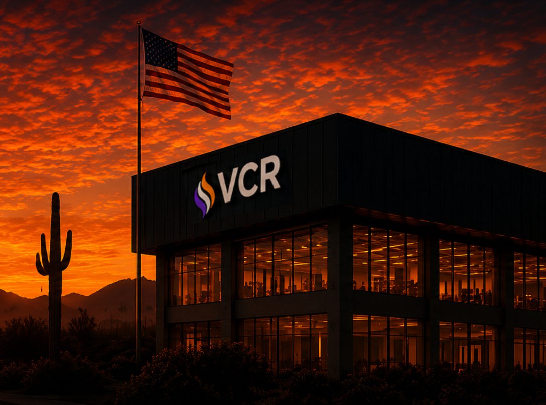 VCR building with American flag at sunset